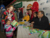 Dr. Ben and Candy Carson Donate and Sign Why America Matters Children’s Books at Schellville Ben Carson giving Why America Matters´ books to children at Schelville DE