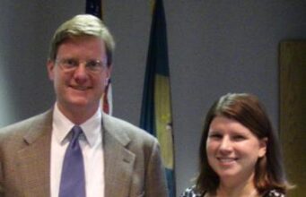 Mr. Go-Glass awarded Outstanding Outreach Award by Delaware Department of Highway Safety Tom Huff accepting Outstanding Outreach Award from Trish Bachman of the Delaware Department of Highway Safety. The award honors companies who make an exception contribution to the goal of reducing traffic fatalities on Delaware roads.