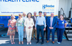 Beebe Healthcare Hosts Sen. Carper, Rep. Blunt Rochester to Discuss Community Mobile Health Initiatives From left to right, Karen Duffield, Beebe Medical Foundation, Gwen Davis, FNP, PMHNP, on the Mobile Health Unit, Kay Young, Beebe Medical Foundation, Rep. Lisa Blunt Rochester, Mike Meoli, Board Chair, Sen. Tom Carper, Bill Chasanov, DO, Chief Health Systems Design Officer, Tom Protack, President, Beebe Medical Foundation, and Emily Hains, RN, on Behavioral Health Unit.