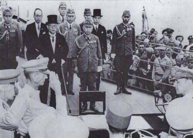 Japanese Delegation approaching the Allied Delegation aboard the USS Missouri BB-63 on September 2, 1945 Courtesy of Friends of the National World War II Memorial