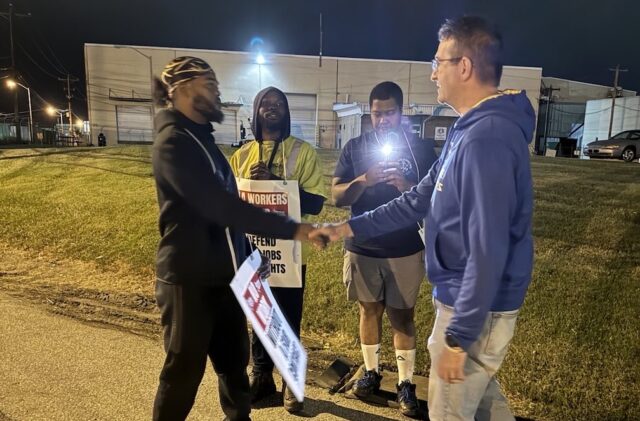 Meyer with union workers from the ILA