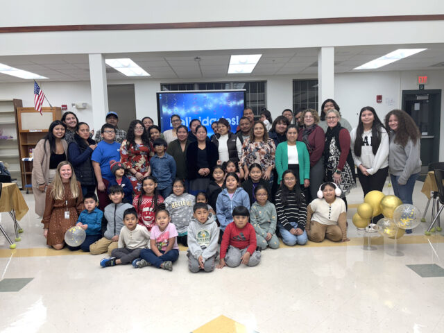 John M. Clayton families, teachers, staff and Indian River High School Leo Club volunteers who participated in the Fall 2024 Latino Family Literacy Program (Photo courtesy IRSD). 