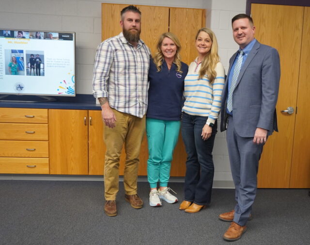 Sussex Academy employees Dawnyel Furlong and Brian Huebler were recognized at the Feb. 19 school board meeting for their quick response to a student medical issue. Gathered are (l-r) school board Vice President Ed Hale, Furlong, school board President Jennifer Donahue and Head of School Kyle Bentley.