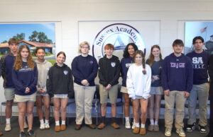 Sussex Academy students host magistrate Magistrate in Chancery David Hume IV visited Sussex Academy to meet with students interested in careers in law. Gathered are (l-r) Head of School Kyle Bentley, Victor Goodhue, Lente Werner, Jaslene Brunskill, Mia Hume, Abigail Tatman, Aleksander Danilenko, Dymond Steele, Ava Watkins, Aubrey Stanislav, Evan Spanos, Grant Burrows and Hume.