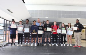 Academic All State and State Champion Sussex Technical High School Wrestlers PHOTO: Left to Right: Marvin Davis, Colton Brennan, Cullen Nichol, Anthony Andrews, Parker Hampton, Bennett Brumbley, Dustin Ellliott, Taryn Taylor, Jade Seefried, Tim Degand Standing in back row: Coach Scott Layfield