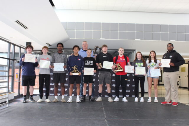 PHOTO: Left to Right: Marvin Davis, Colton Brennan, Cullen Nichol, Anthony Andrews, Parker Hampton, Bennett Brumbley, Dustin Ellliott, Taryn Taylor, Jade Seefried, Tim Degand Standing in back row: Coach Scott Layfield PHOTO: Left to Right: Marvin Davis, Colton Brennan, Cullen Nichol, Anthony Andrews, Parker Hampton, Bennett Brumbley, Dustin Ellliott, Taryn Taylor, Jade Seefried, Tim Degand Standing in back row: Coach Scott Layfield