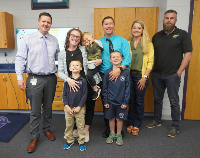 The Sussex Academy school board recognized 2025-26 Teacher of the Year Megan Stevens at its May 21 meeting. Gathered are in back (l-r) Head of School Kyle Bentley, Megan Stevens holding son Keegan Stevens, Sam Stevens, board President Jen Donahue and board Vice President Ed Hale. In front are Cooper Stevens and Lucas Stevens. (Photo courtesy Sussex Academy). The Sussex Academy school board recognized 2025-26 Teacher of the Year Megan Stevens at its May 21 meeting. Gathered are in back (l-r) Head of School Kyle Bentley, Megan Stevens holding son Keegan Stevens, Sam Stevens, board President Jen Donahue and board Vice President Ed Hale. In front are Cooper Stevens and Lucas Stevens. (Photo courtesy Sussex Academy).