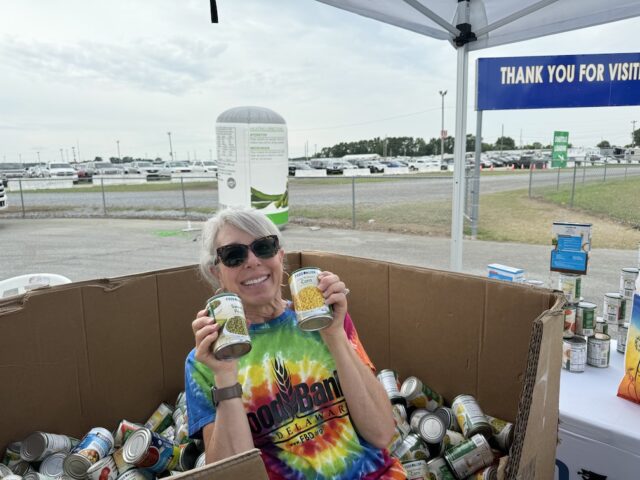 Food Bank of Delaware Community Resource Manager Sue DeNardo shows off donations collected at last year’s Delaware State Fair. (Photo credit: FBD)