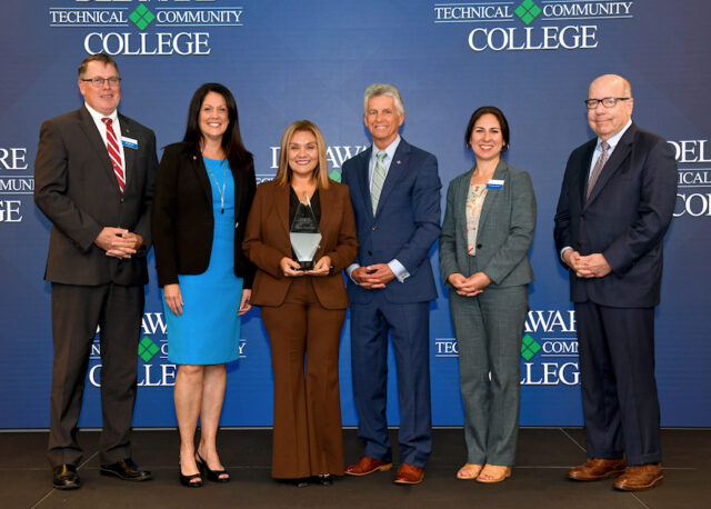 Delaware Tech leadership presents Deadwyler with the 2025 Hispanic Heritage Honoree Award. From left, Dan Ehman, vice president and campus director at the Stanton Campus; Dr. Lora Johnson, vice president and campus director at the Wilmington Campus; Yvonne Deadwyler; Dr. Mark Brainard, Delaware Tech president; Dr. Justina Thomas, executive vice president; Michael Hare, Delaware Tech Board of Trustees