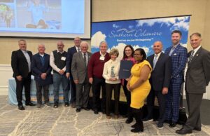 Winners of the 2025 Southern Delaware Tourism Awards Announced Legacy Award: Winner Carol Everhart. L to R: Scott Anthony, Southern Delaware Tourism Chairperson; Doug Hudson, Sussex County Council President; Steve McCarron, Sussex County Councilman; Russ Huxtable, DE State Senator; Dave Wilson, DE State Senator; John Rieley, Sussex County Council Vice President; Carol Everhart, honoree; Claire Snyder-Hall, DE State Representative; Alonna Berry, DE State Representative; Scott Thomas, Executive Director of Southern Delaware Tourism; Benjamin Gray, COO Mercantile Processing; Ron Gray, DE State Representative (Photo courtesy Southern Tourism)