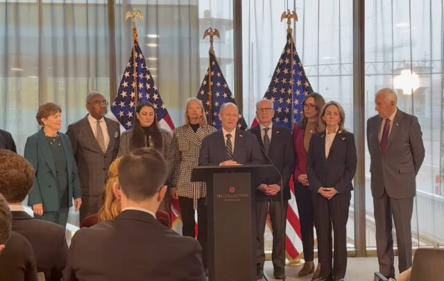 Senator Coons discusses congressional delegation to Copenhagen at press conference (Photo Cortesy Sen Coons' Office)