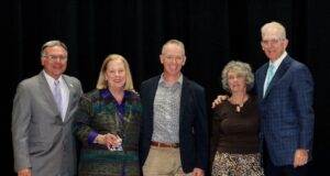 Sharon Kelly Baker Named 2026 John H. Taylor, Jr. Education Leadership Award Recipient Left to right: Rob Rescigno, member of the award selection committee; Sharon Kelly Baker; John Taylor; Maria Taylor; Michael J. Quaranta, DSCC President (Photo Credit: Hannah Paliath)