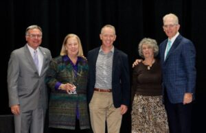 Sharon Kelly Baker Named 2026 John H. Taylor, Jr. Education Leadership Award Recipient Left to right: Rob Rescigno, member of the award selection committee; Sharon Kelly Baker; John Taylor; Maria Taylor; Michael J. Quaranta, DSCC President (Photo Credit: Hannah Paliath)