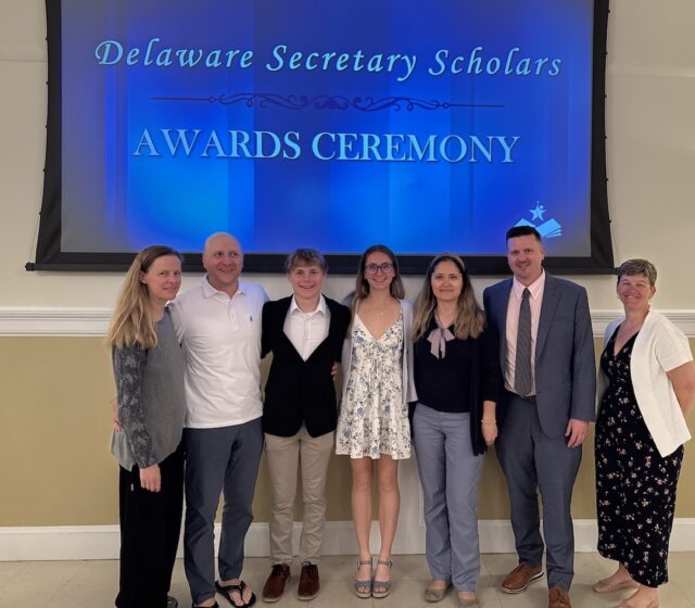 SussexAcademy seniors Katya Geyer and Noah Benz were named Secretary of Education Scholars for 2026. Gathered at an April 13 recognition event in Dover are (l-r) Francoise Benz, Nick Benz, Noah Benz, Katya Geyer, Olga Bakhar, Head of School Kyle Bentley and Dean of High School Lauren Hvorecny.