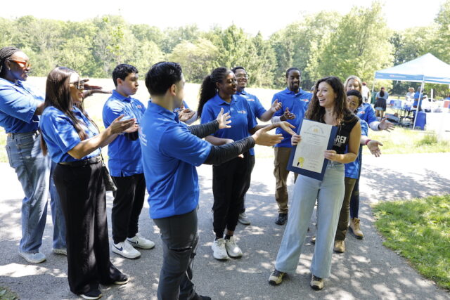 State Representative Sophie Phillips with the WeLoveU volunteers after reading the Proclamation. (Photo HOY en Delaware)