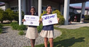 Legislators, leaders convene at annual Sussex Academy showcase Sussex Academy Elementary students Bethsaida Bellevue, left, and Sayuri Perez Perez welcome guests to the school’s second annual open house for elected leaders and community representatives.