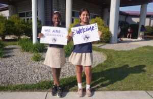 Legislators, leaders convene at annual Sussex Academy showcase Sussex Academy Elementary students Bethsaida Bellevue, left, and Sayuri Perez Perez welcome guests to the school’s second annual open house for elected leaders and community representatives.