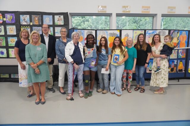 Sussex Academy Elementary recognized the parents, high school student mentors and Read Aloud Delaware volunteers who dedicate hours of their time to the school. Gathered are (l-r) Jo Ann Mondrus, Stacy Penaranda, David Smith, Mary Kay Williams, Joan Caputo, Debora Williams, Katerine Amador, Annahbella Crisci, Lenny Truitt, Rebecca Timmons, Paige Taylor and Jeremy Taylor Jr.