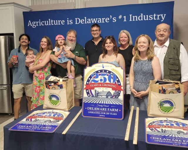 Hill Island: S.R. Smith III, Lea Hutchins and family join Delaware Gov. Matt Meyer, Lt. Gov. Kyle Evans Gay and Agriculture Secretary Don Clifton during Thursday’s event. (Photo courtesy DDA)