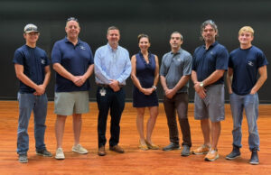 Sussex Academy theater floor shines thanks to Zorzi Creations donation Photo cover (Courtesy of Sussex Academy): Over the summer, Zorzi Creations completely refinished the stage floor at Sussex Academy, at no charge to the charter school. Gathered on the newly refinished theater stage are (l-r) Tyler Smith, Dave Bryan, Head of School Kyle Bentley, Lindsay Zorzi, Mario Zorzi, Mike Zorzi and Ryan Beard.