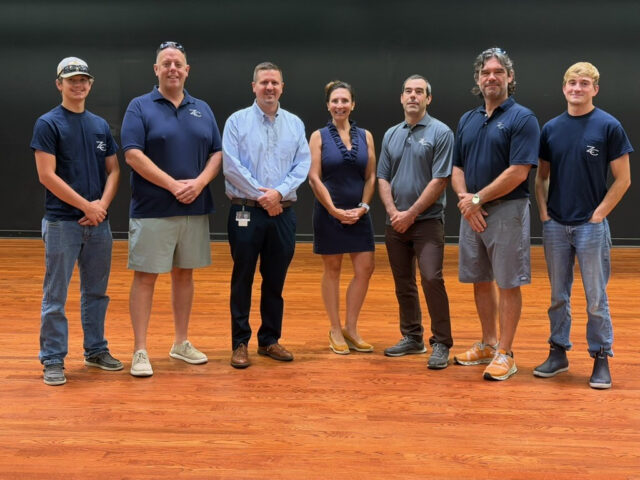 Photo cover (Courtesy of Sussex Academy): Over the summer, Zorzi Creations completely refinished the stage floor at Sussex Academy, at no charge to the charter school. Gathered on the newly refinished theater stage are (l-r) Tyler Smith, Dave Bryan, Head of School Kyle Bentley, Lindsay Zorzi, Mario Zorzi, Mike Zorzi and Ryan Beard.