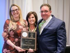 At Annual Gala, atTAcK addiction honors those making a difference in the fight against addiction atTAcK addiction board members Fran Russo-Avena (center) and Karl Fischer present atTAcK addiction's highest honor, the Medal of Honor, to Joanna Champney, director of the Delaware Division of Substance Abuse and Mental Health, the organization's Oct. 22 Be a Hero Gala. (Photo courtesy atTAck addiction)