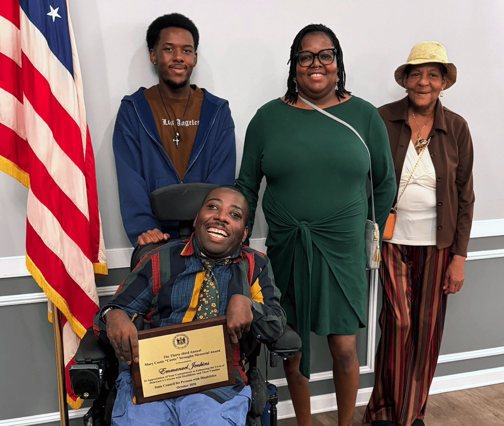 2026 “Custie” Award winner Emmanuel Jenkins was joined by his wife Sharliena Berry, son Kailyin Berry, and mother-in-law Brenda Mettle. (Photo courtesy DSHS)